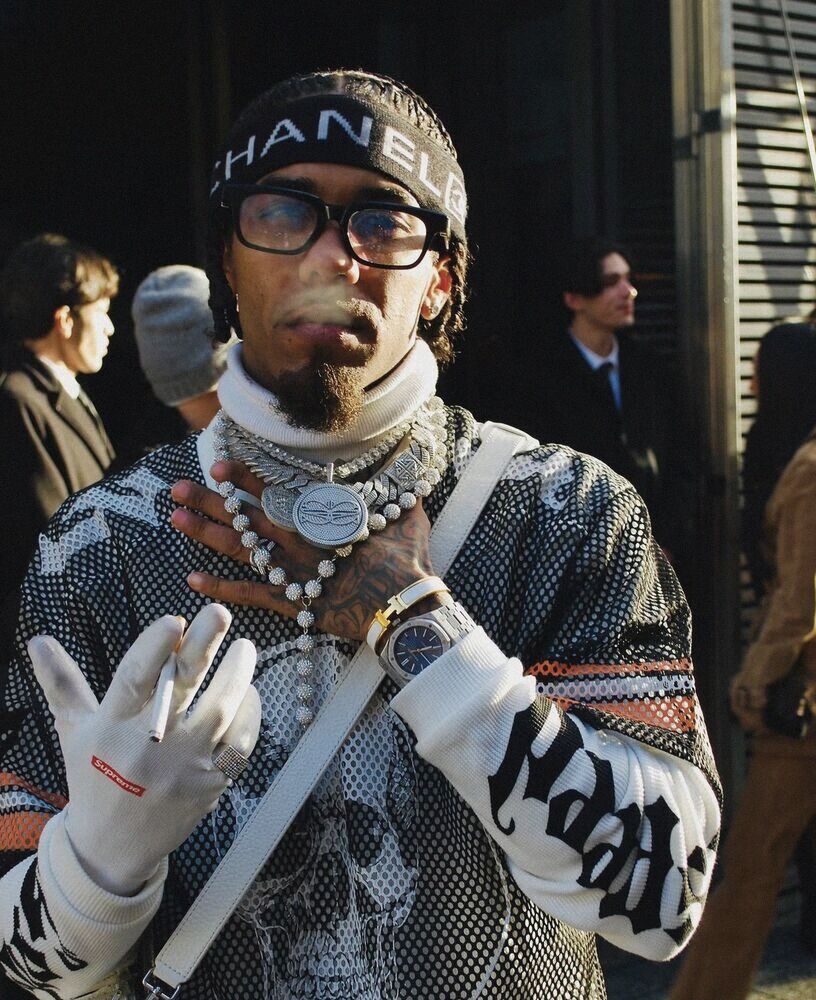Man in a beanie and layered chains