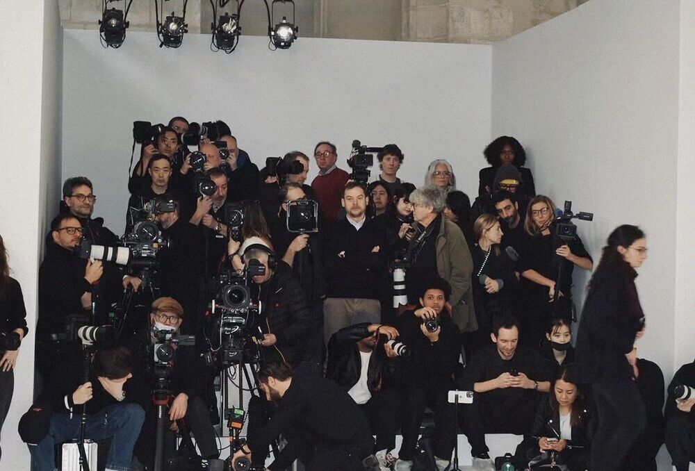 The photographers' pit, packed with cameras